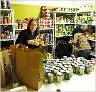 People rely on food banks, like the Community Food and Outreach Center in Orlando, Fla.