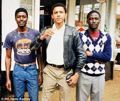 Obama's pedophile brother in t-shirt -his name is samson obama, he was barred from entering the U.K.