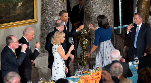 President Barack Obama, makes a toast with his wife first lady Michelle Obama, during a luncheon after his ceremonial swearing-in on Capitol Hill in Washington, Monday, Jan. 21, 2013. Others are, from left, Sen. Lamar Alexander, R-Tenn., Vice President Joe Biden, Jill Biden, Chairman of the Joint Congressional Committee on Inaugural Ceremonies, Sen. Charles Schumer, D-N.Y., and Speaker of the House John Boehner, R-Ohio.  (AP Photo/Manuel Balce Ceneta)