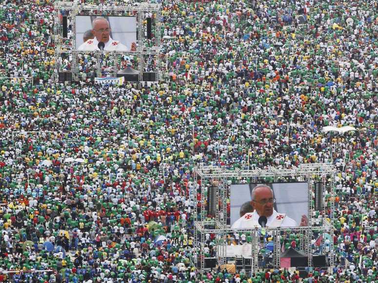 Pope Francis Speaks To Three million people who have gathered on Rio beach for mass.
