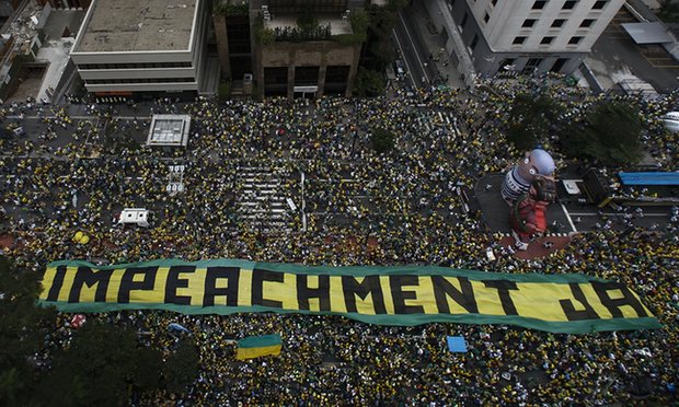 Demonstrators in São Paulo take part in a protest to demand the resignation of Dilma Rousseff. Photograph: Miguel Schincariol/AFP/Getty Images